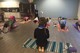 Calming our minds in an onsite yoga class